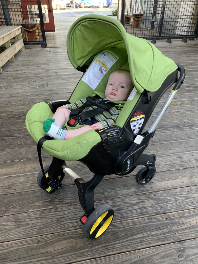 Brock in the Doona -- the first car seat and stroller in one. It's so easy and convenient to use!