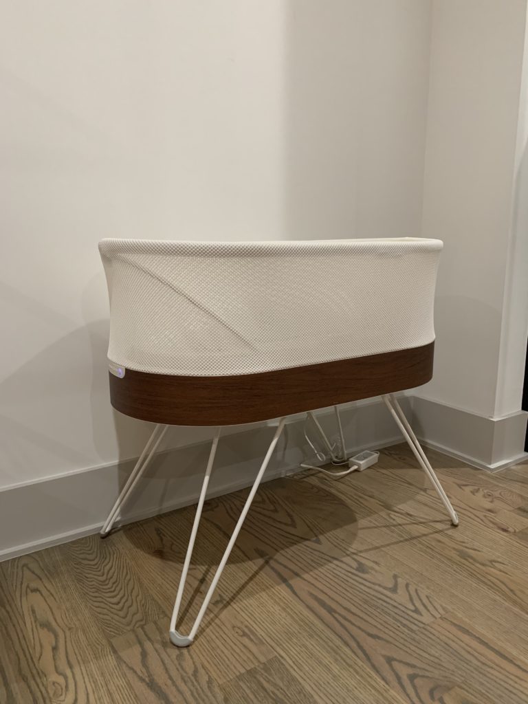 The SNOO is a modern, sleek bassinet that doubles as an infant sleep system, helping babies fall asleep faster and stay asleep longer.