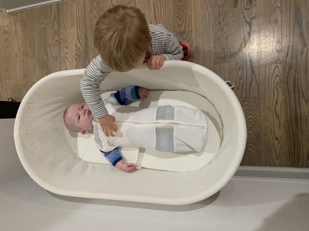 Braeden likes to peer in on Brock when he's in the SNOO. 