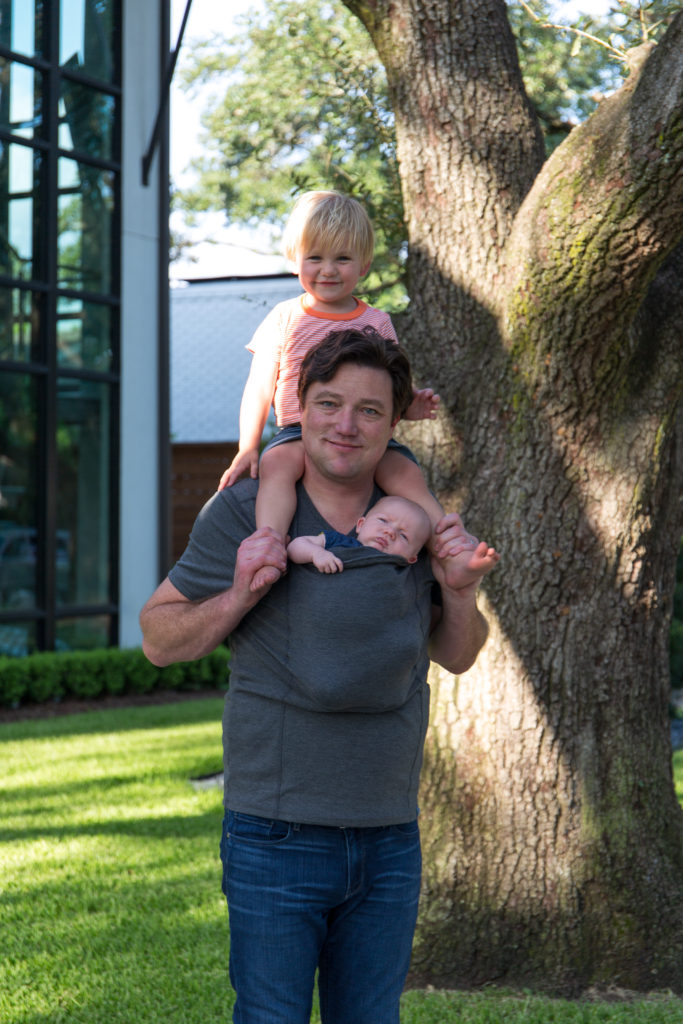 Brandon wearing our infant son, Brock, in the Lalabu Dad Shirt. It's a kangaroo pouch shirt that allows dads to wear the baby without any straps, clasps, or wraps.
